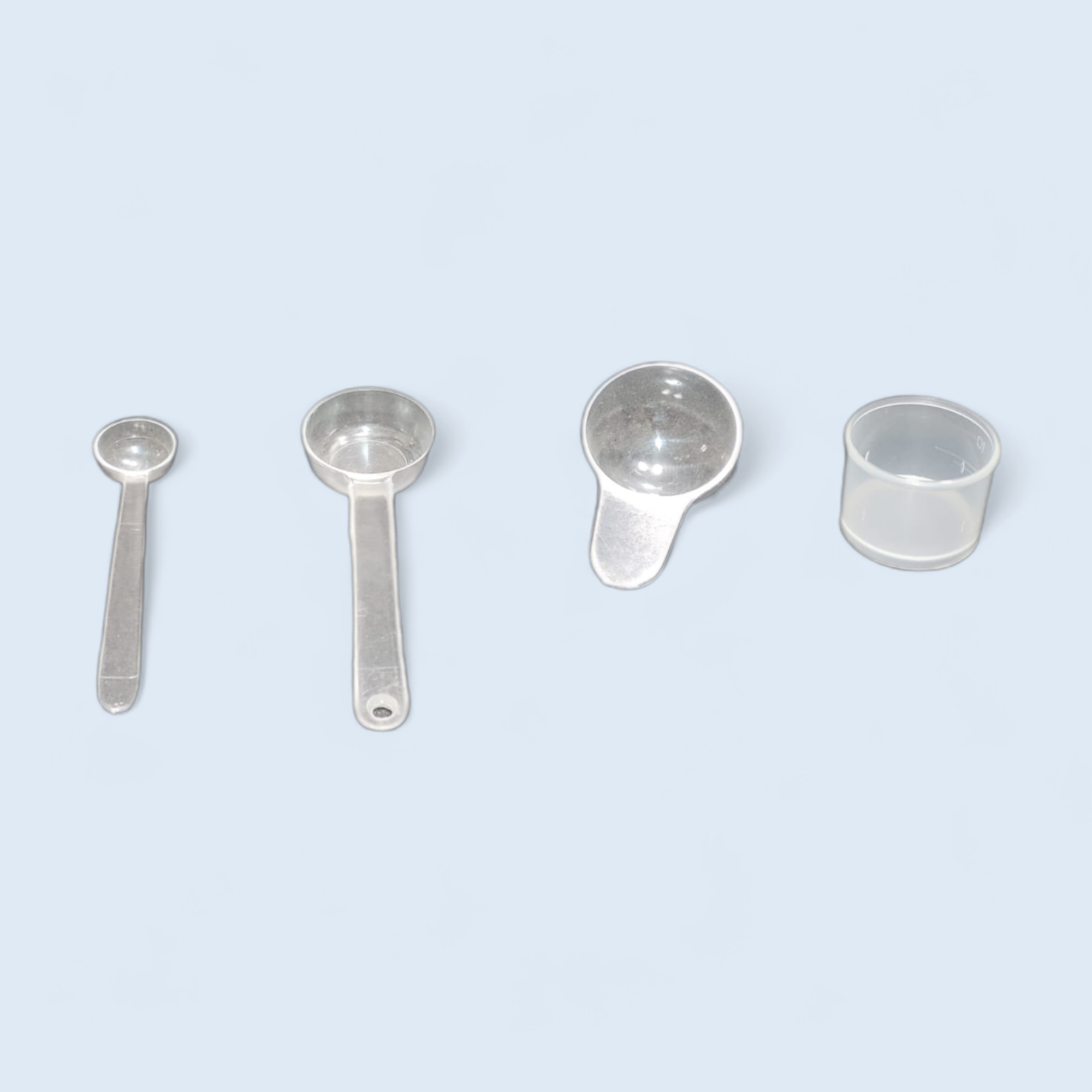 Cucharas y vaso medidor